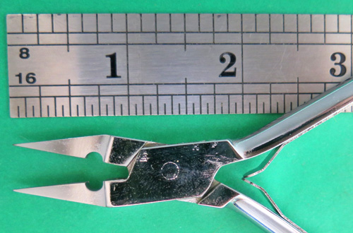#LONGNIBPLIERS: LONG HANDLE PLIERS FOR WORKING ON NIBS. SAME SIZE JAWS AS OUR ORIGINAL 3" NIB PLIERS, BUT WITH LONGER HANDLE. NO SERRATIONS ON THE INSIDE SURFACES OF JAWS. MADE OF CHROME PLATED STEEL WITH BOX JOINTS.